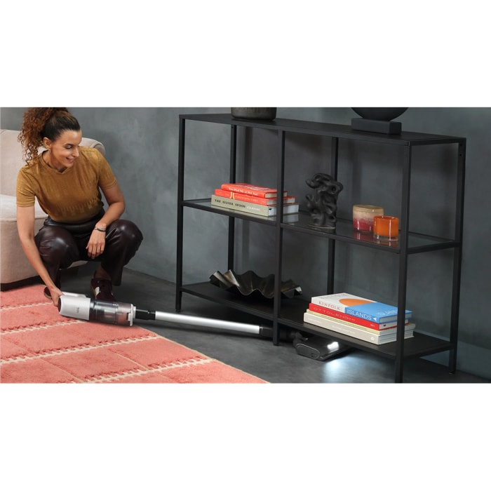 Cordless cleaner designed for easy cleaning under furniture.