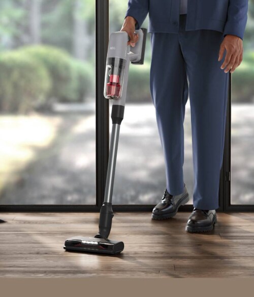 Man vacuuming floor